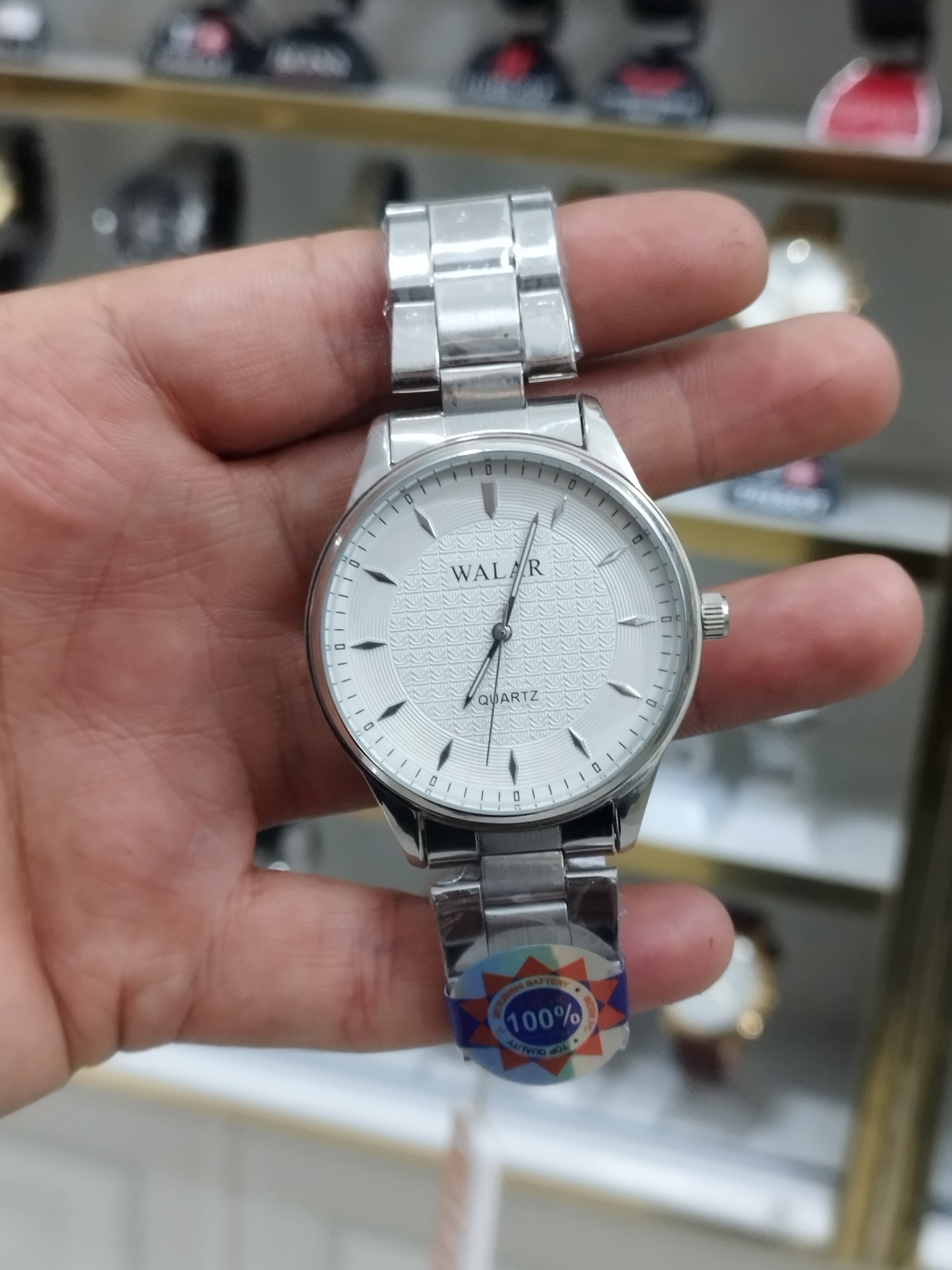 ساعت مردانه استیل رنگ ثابت بند استیل قفل فشاری همراه با باتری اشانتیون