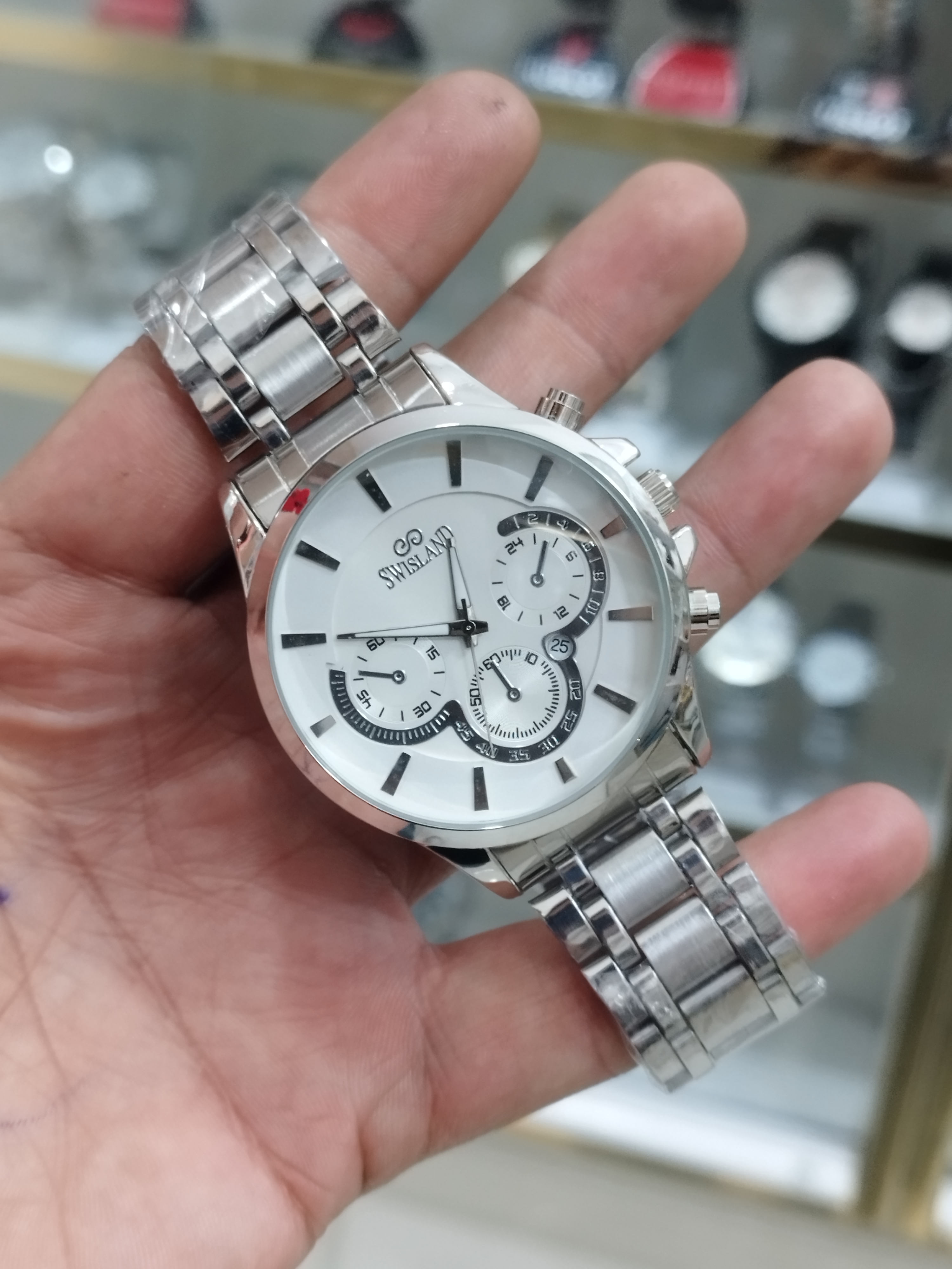 ساعت سوئیسلند مردانه تقویم دار طرح 3 موتور استیل رنگ ثابت ضد آب همراه با جعبه رایگان و باتری اشانتیون