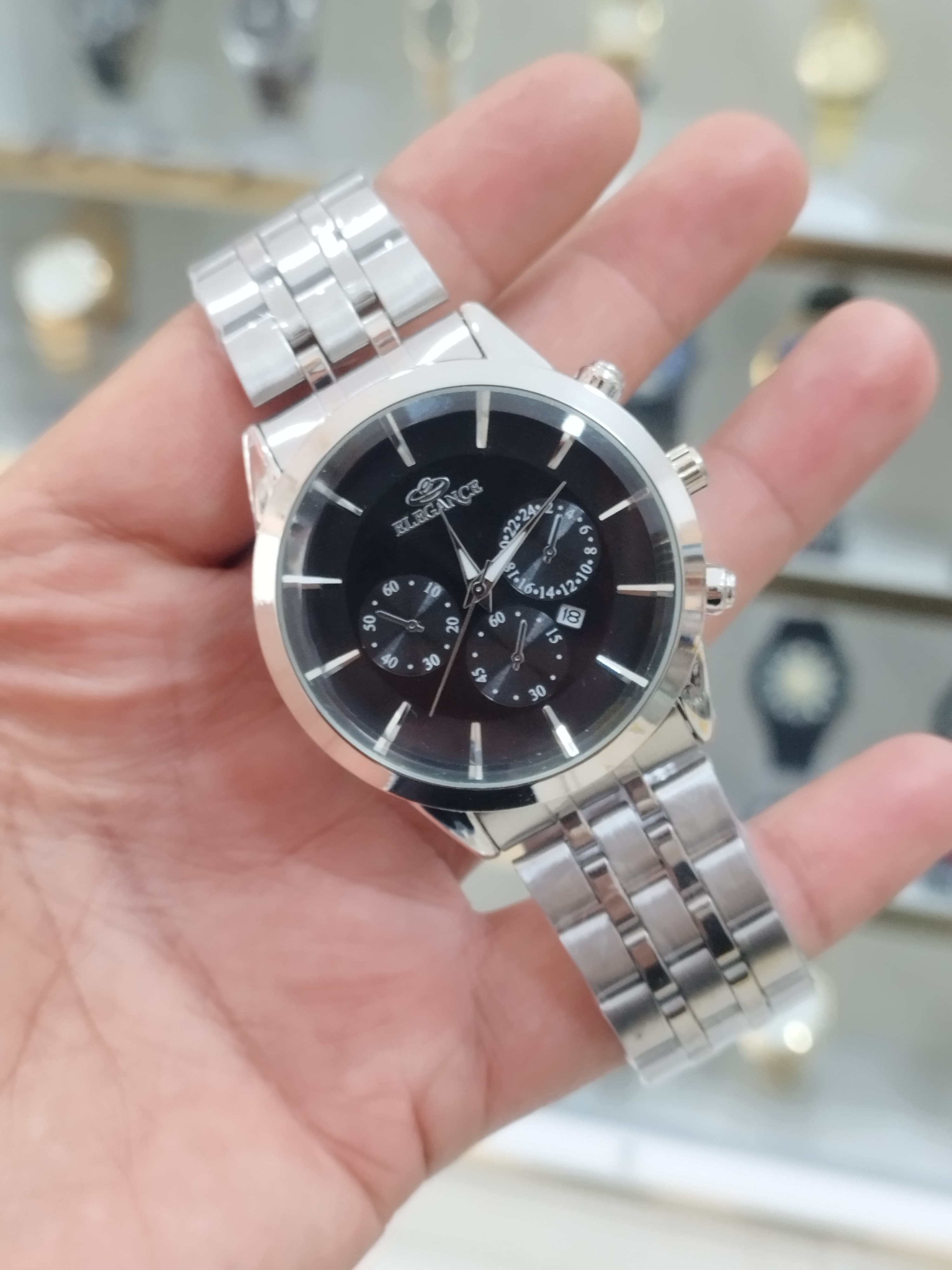 ساعت الگانس مردانه تقویم دار طرح 3 موتور استیل رنگ ثابت ضد آب همراه با جعبه رایگان و باتری اشانتیون//