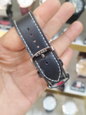 ساعت مردانه استیل رنگ ثابت ضد آب بند چرم بند سگکی قابل تنظیم همراه با باتری اشانتیون و جعبه رایگان